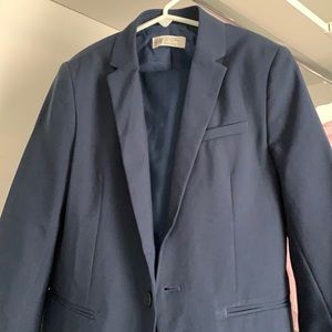 Boys blue suit jacket, worn on one occasion.